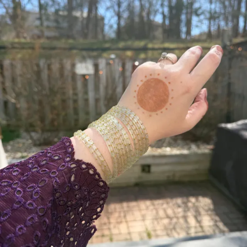 Customer photo: glass bangles on wrist